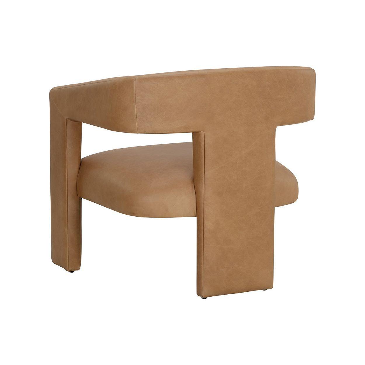 Fauteuil lounge en cuir Sculptural Sésame avec assise large et dossier arrondi pour salon
