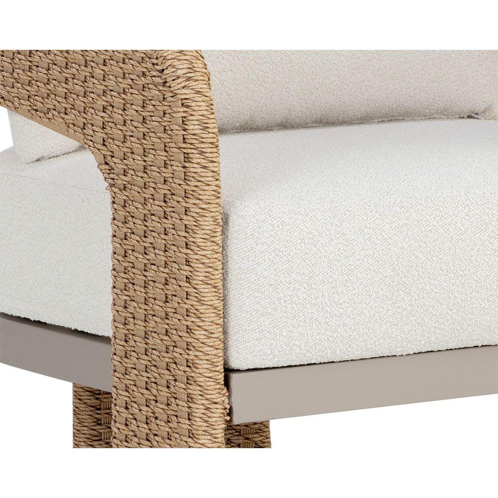 Fauteuil de jardin géométrique torsadé en osier et aluminium avec coussin en boucle haute performance pour terrasse