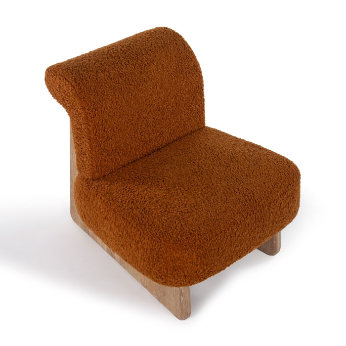 Fauteuil moderne classique en bouclette et chêne massif avec piètement luge pour salon ou bureau